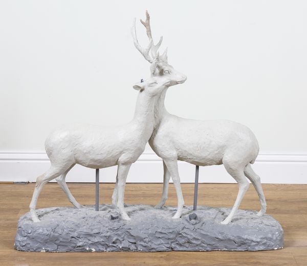 A PAINTED PLASTER MODEL OF TWO STAGS