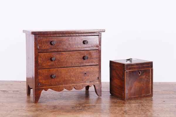 A 19TH CENTURY FRUITWOOD MINIATURE THREE DRAWER CHEST (2)