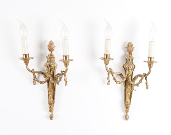 A PAIR OF LOUIS XVI STYLE GILT-METAL TWIN LIGHT WALL APPLIQUÉS AND ANOTHER SET OF FOUR (6)