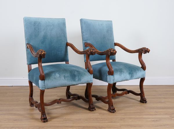 A PAIR OF CONTINENTAL WALNUT FRAMED OPEN ARMCHAIRS (2)