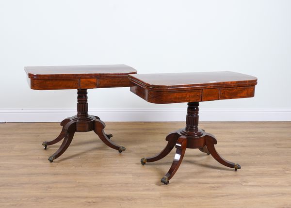 A PAIR OF REGENCY MAHOGANY AND EBONY FOLDOVER CARD TABLES (2)