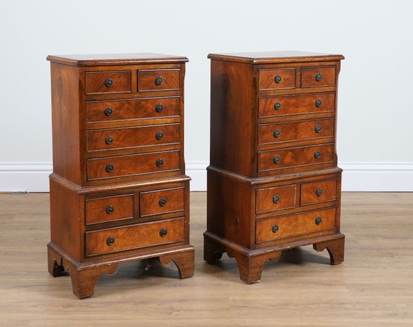 A PAIR OF 18TH CENTURY STYLE MINIATURE MAHOGANY EIGHT DRAWER CHEST ON CHEST  (2)