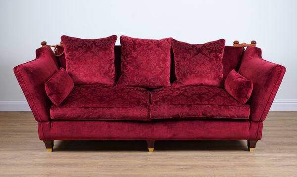 POSSIBLY DURESTA: A RED UPHOLSTERED DROP END KNOLL SOFA