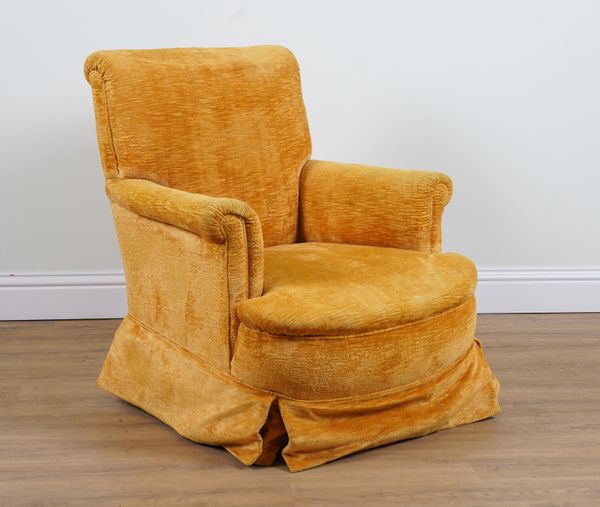 A MODERN YELLOW UPHOLSTERED ARMCHAIR