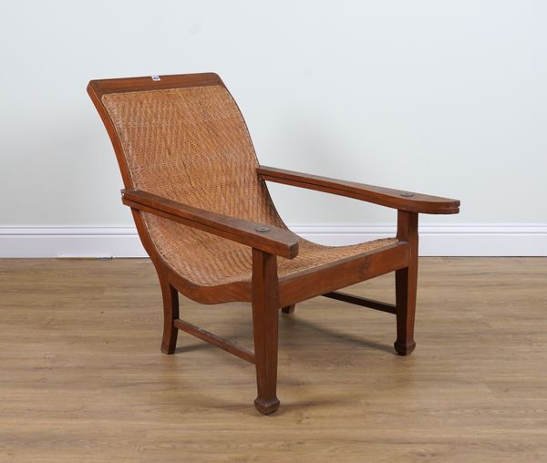 A TEAK AND RATTAN PLANTATION CHAIR