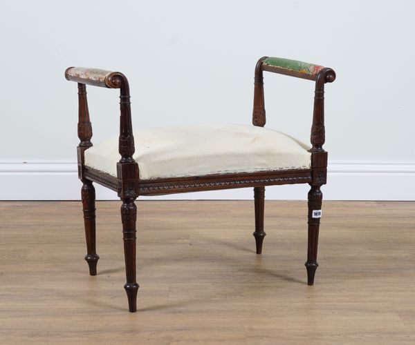 A LATE VICTORIAN CARVED MAHOGANY FRAMED WINDOW SEAT