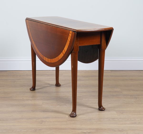 A GEORGE II SATINWOOD BANDED MAHOGANY DROP FLAP TABLE