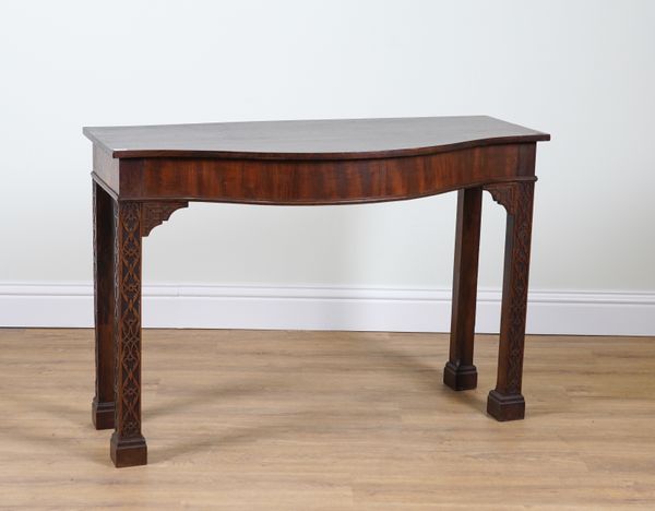 AN 18TH CENTURY MAHOGANY SERPENTINE CONSOLE TABLE