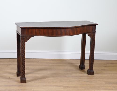 AN 18TH CENTURY MAHOGANY SERPENTINE CONSOLE TABLE