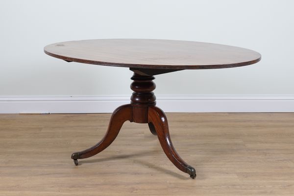 A 19TH CENTURY OVAL MAHOGANY SNAP TOP CENTRE TABLE