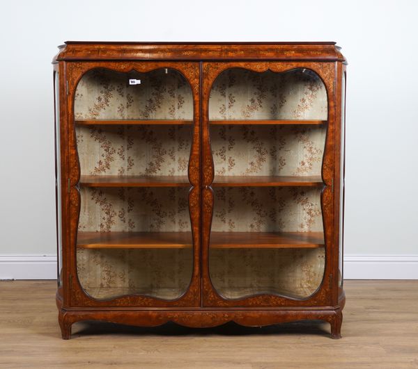 A LATE 19TH CENTURY MARQUETRY INLAID SATINWOOD TWO DOOR DISPLAY CABINET