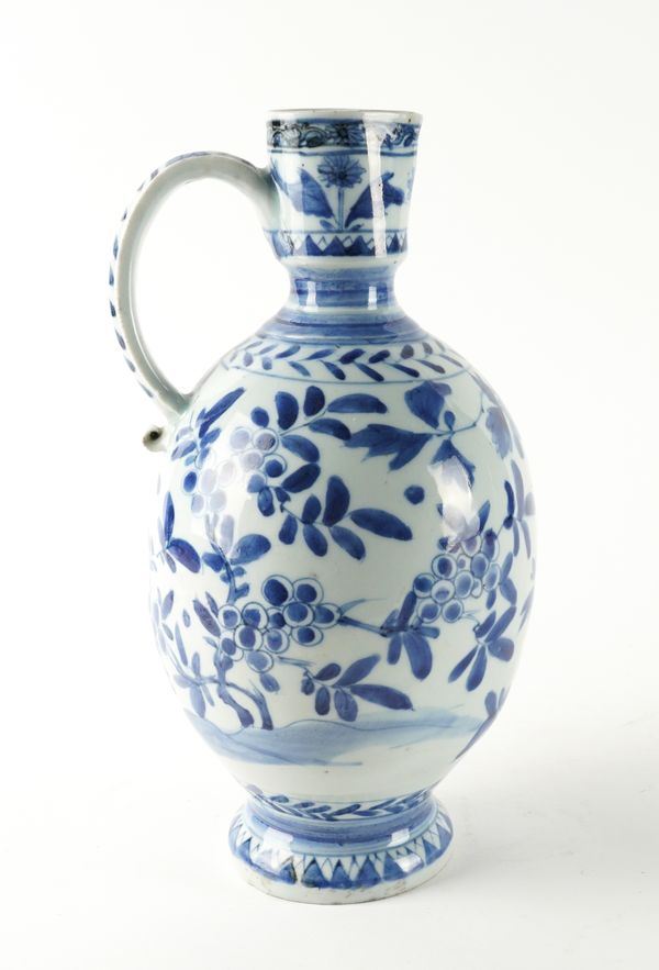 AN ARITA BLUE AND WHITE EWER