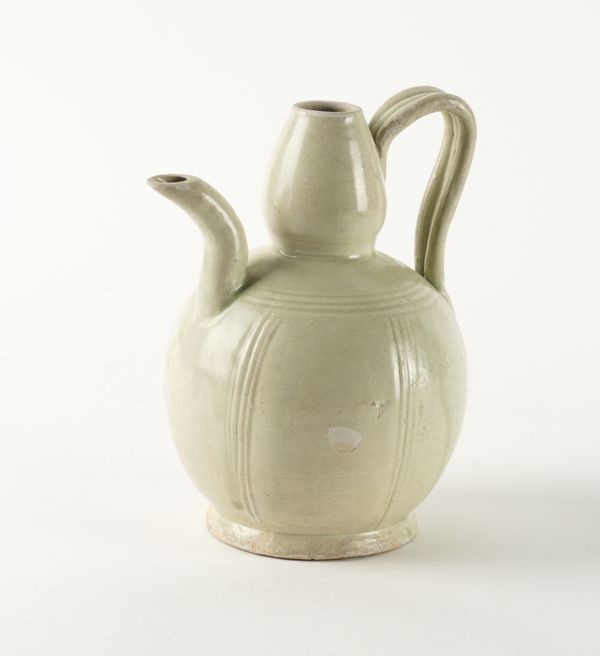 A CHINESE POTTERY EWER