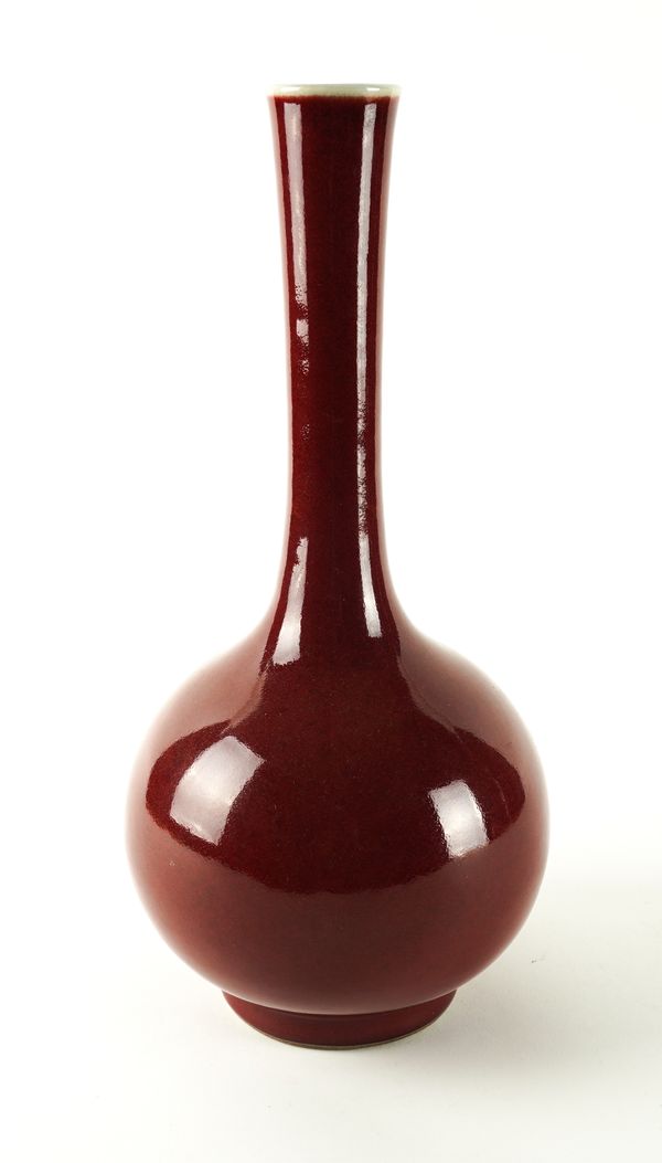 A CHINESE FLAMBE GLAZED BOTTLE VASE