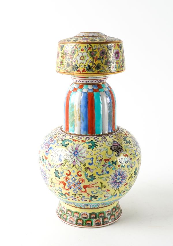 A CHINESE FAMILLE-ROSE YELLOW-GROUND ALTAR VASE, BENBAPING (2)