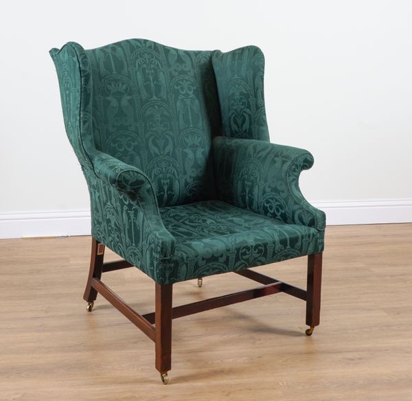 A GEORGE II MAHOGANY FRAMED WINGBACK ARMCHAIR