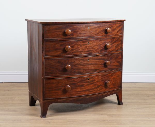 A GEORGE III MAHOGANY BOWFRONT FOUR DRAWER CHEST