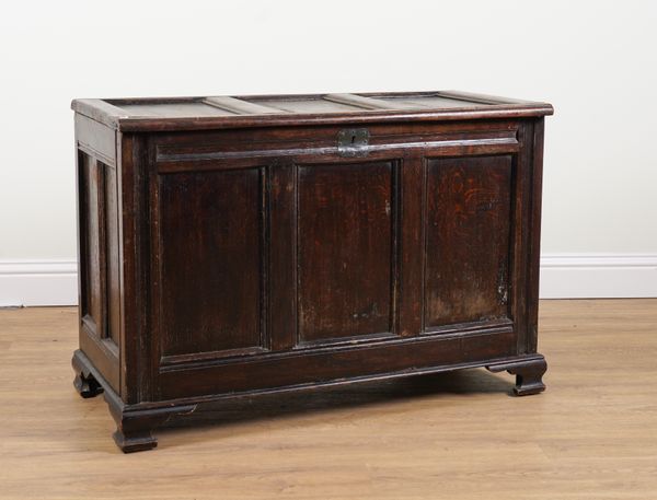 A 17TH CENTURY OAK PANELLED COFFER