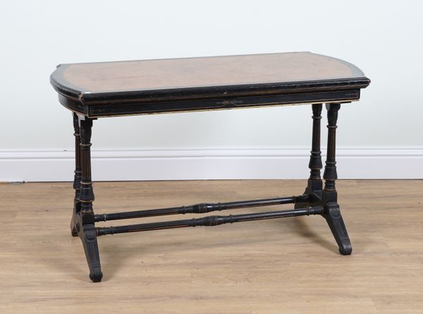 A VICTORIAN BURR WALNUT AND EBONISED CENTRE TABLE