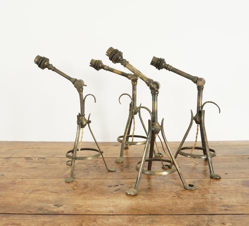 IN THE STYLE AFTER W.A.S. BENSON: FOUR ADJUSTABLE PULLMAN STYLE TABLE LAMPS (4)