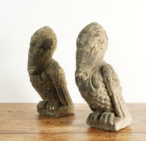 A PAIR OF RECONSTITUED STONE PELICAN FINIALS (2)