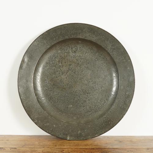 ROBERT MASSAM: AN ENGLISH PEWTER FLAT RIM CHARGER