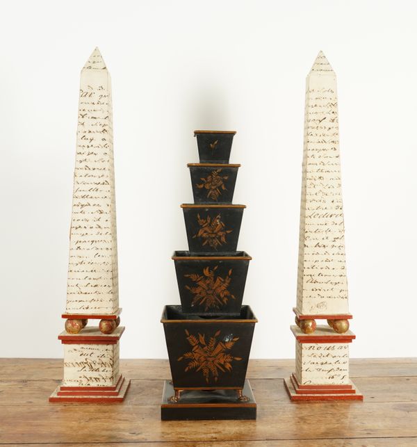 A CHINOISERIE PARCEL-GILT DECORATED TOLE PEINTE JARDINIERE AND A PAIR OF OBELISKS (3)