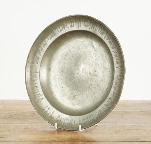 A CZECH PEWTER PLATE WITH HEBREW INSCRIPTION