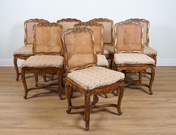 A SET OF EIGHT LOUIS XV STYLE GOLD PAINTED DINING CHAIRS (2)