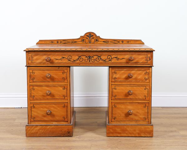 A LATE 19TH CENTURY SATINWOOD AND SATINBIRCH PEDESTAL DESK