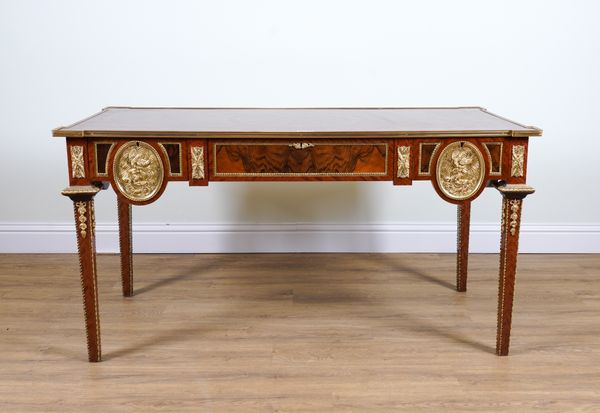 A 19TH CENTURY FRENCH ORMOLU MOUNTED, KINGWOOD TULIP WOOD AND WALNUT THREE DRAWER WRITING DESK