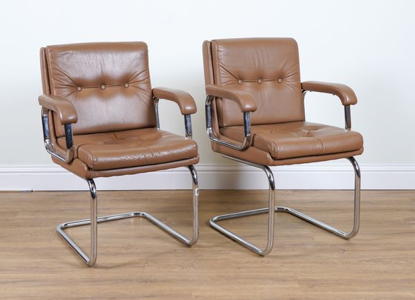 AFTER JOSEF MULLER; A PAIR OF MODERN TUBULAR CHROME FRAMED OPEN ARMCHAIRS (2)