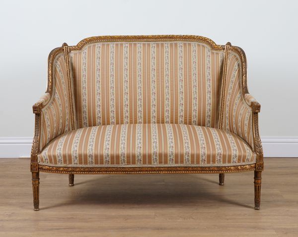 A LOUIS XVI STYLE GOLD PAINTED TWO SEAT SOFA