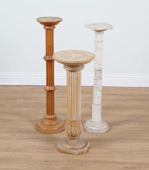 A MARBLE PEDESTAL COLUMN OR TORCHERE TOGETHER WITH TWO OTHERS  (3)