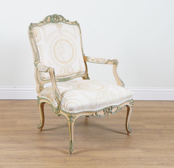 A LOUIS XV STYLE POLYCHROME PAINTED OPEN ARMCHAIR