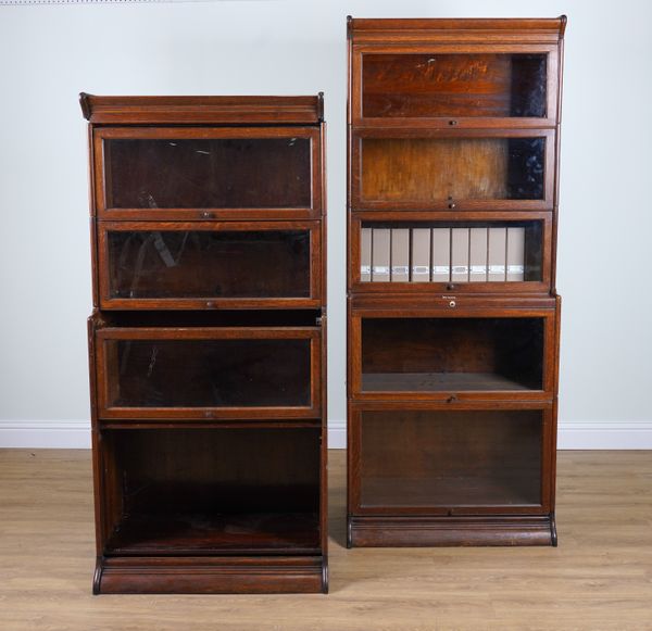 A TWO GLOBE WERNICKE STYLE OAK FIVE TIER BOOKCASES (2)