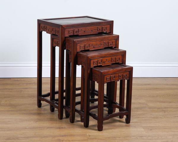 A CHINESE HARDWOOD NEST OF FOUR TABLES