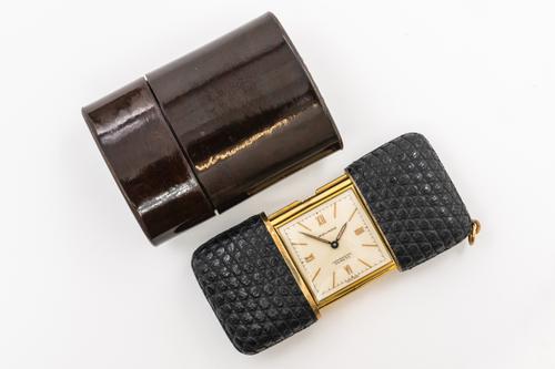 A MOVADO ERMETO FOLDING PURSE WATCH