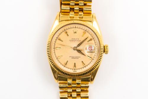 A GOLD ROLEX DATEJUST WATCH