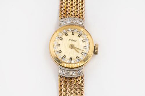 A METEOR DIAMOND SET WATCH