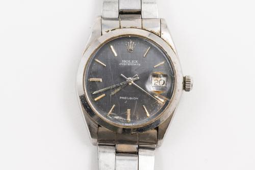 A ROLEX PRECISION OYSTER DATE STEEL WATCH