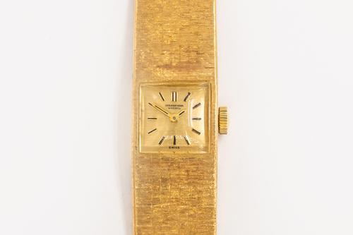 AN IWC 18CT GOLD WATCH