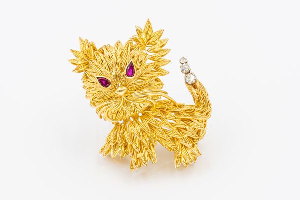 CARTIER - A RUBY AND DIAMOND CAT BROOCH