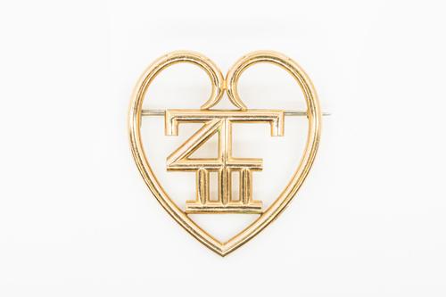 CARTIER - A GOLD BROOCH