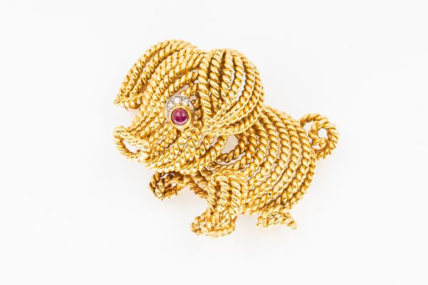 VAN CLEEF AND ARPELS - A RUBY AND DIAMOND PIG BROOCH
