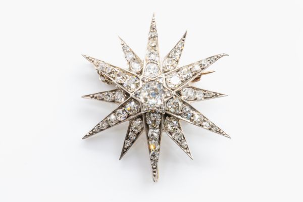 A VICTORIAN DIAMOND STAR PENDANT BROOCH