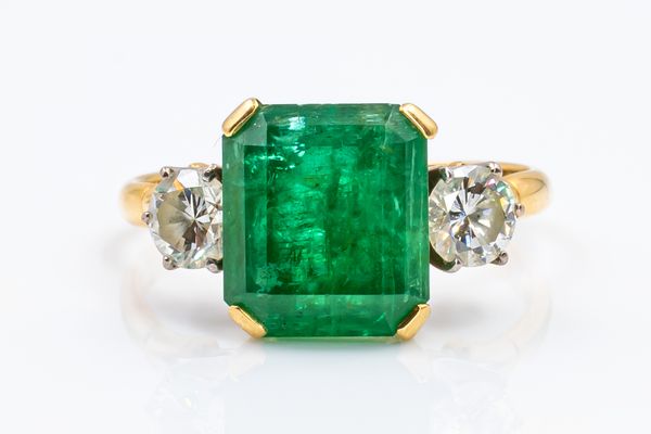 AN EMERALD AND DIAMOND TRILOGY RING