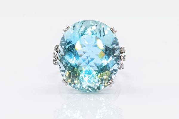 A LARGE AQUAMARINE AND DIAMOND COCKTAIL RING