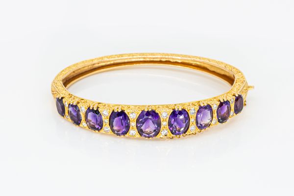 A VINTAGE AMETHYST AND DIAMOND BANGLE