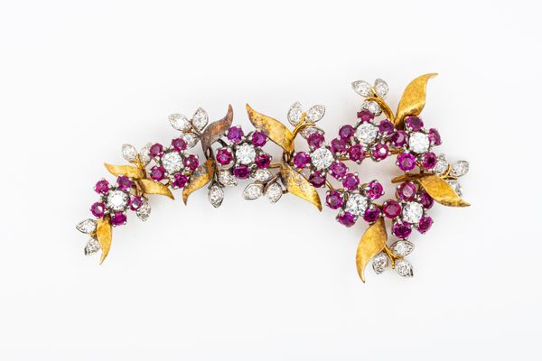 A RUBY AND DIAMOND FLORAL SPRAY BROOCH